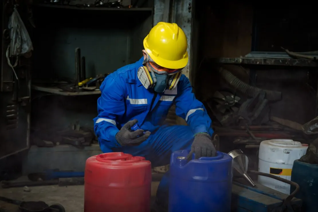 Man working with chemicals